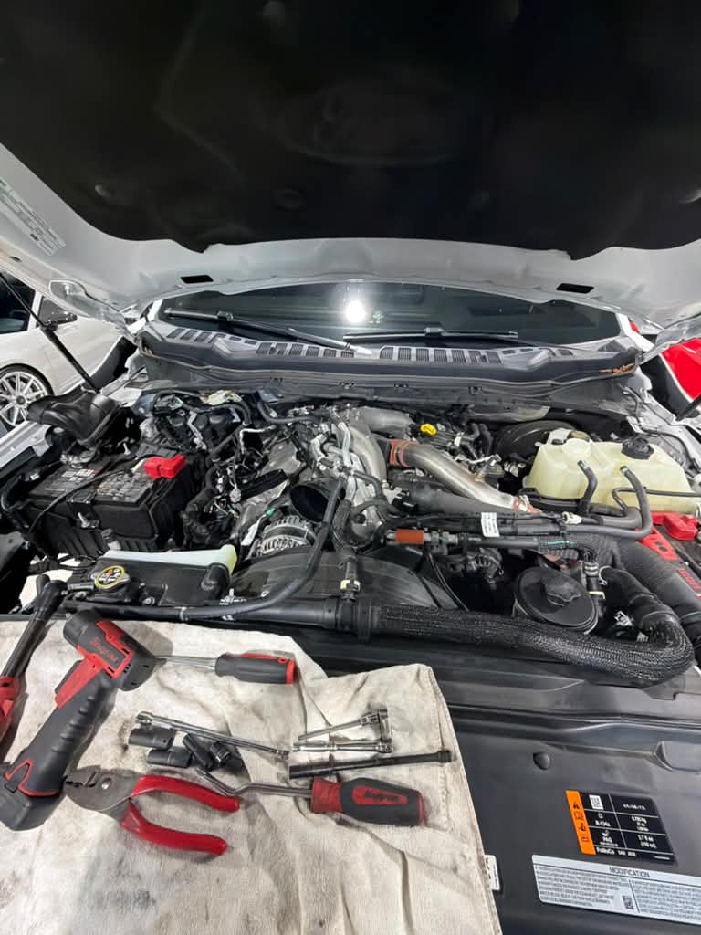 Diesel engine components undergoing maintenance